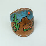 Leather Cuff with carved and painted desert scene with cactus adjustable size