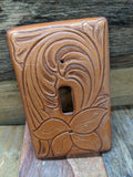 Switch plate cover made on leather and tooled floral pattern