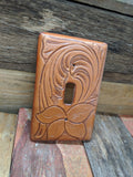 Switch plate cover made on leather and tooled floral pattern