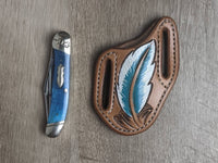 Turquoise bone handled Rough Rider Trapper knife with matching painted feather Leather Pancake Style sheath